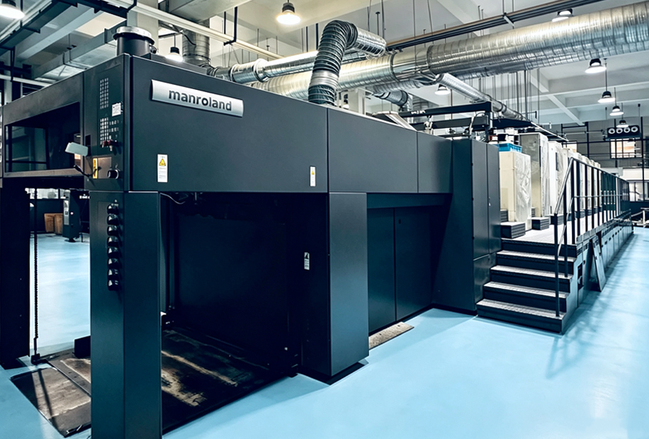 Industrial Manroland printing press in the production workshop