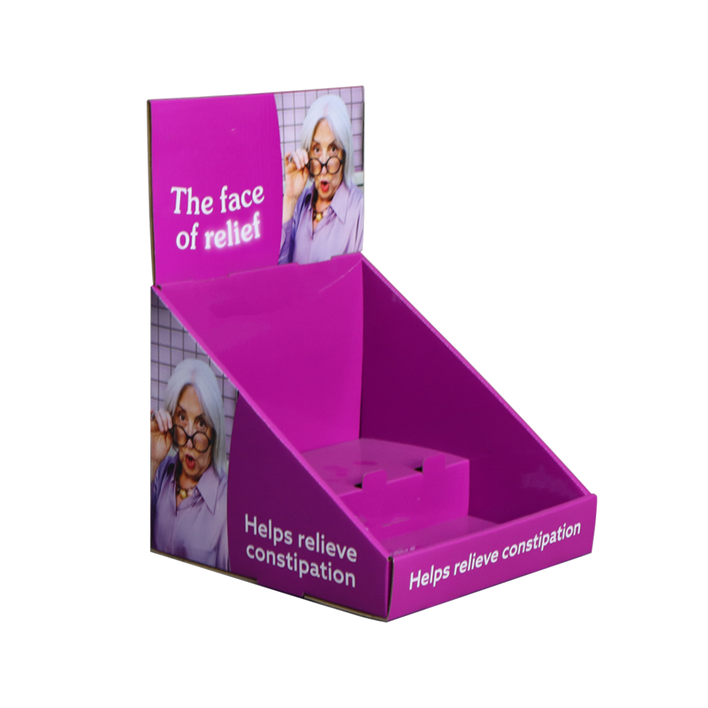 Left-angle view of a purple medicine PDQ display box with high side walls and a printed header