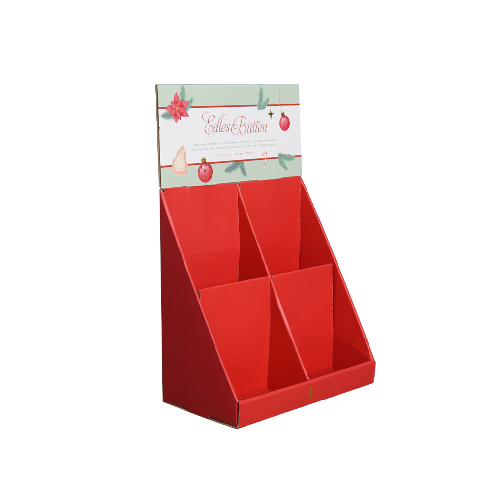 Angled view of a four-compartment Christmas cardboard PDQ display