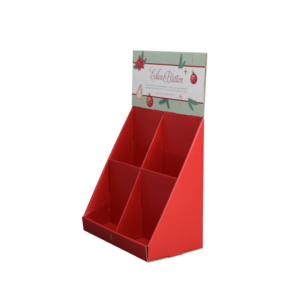 Red cardboard PDQ display with four compartments and Christmas header